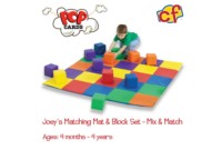 boy playing with matching mat and block set