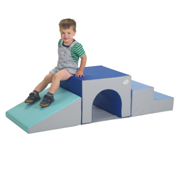 Child sitting on tunnel climber