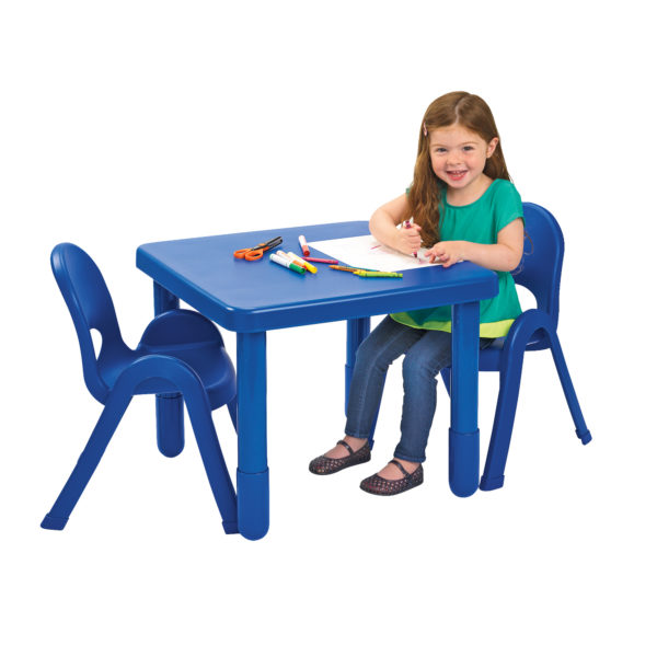 girl sitting at blue square value table