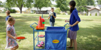 Indoor-outdoor play is easy with the mobile Ball Cart