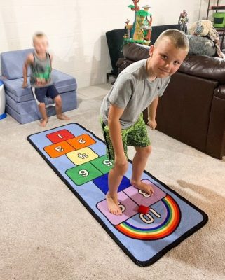 rainbow hopscotch carpet for gross motor development